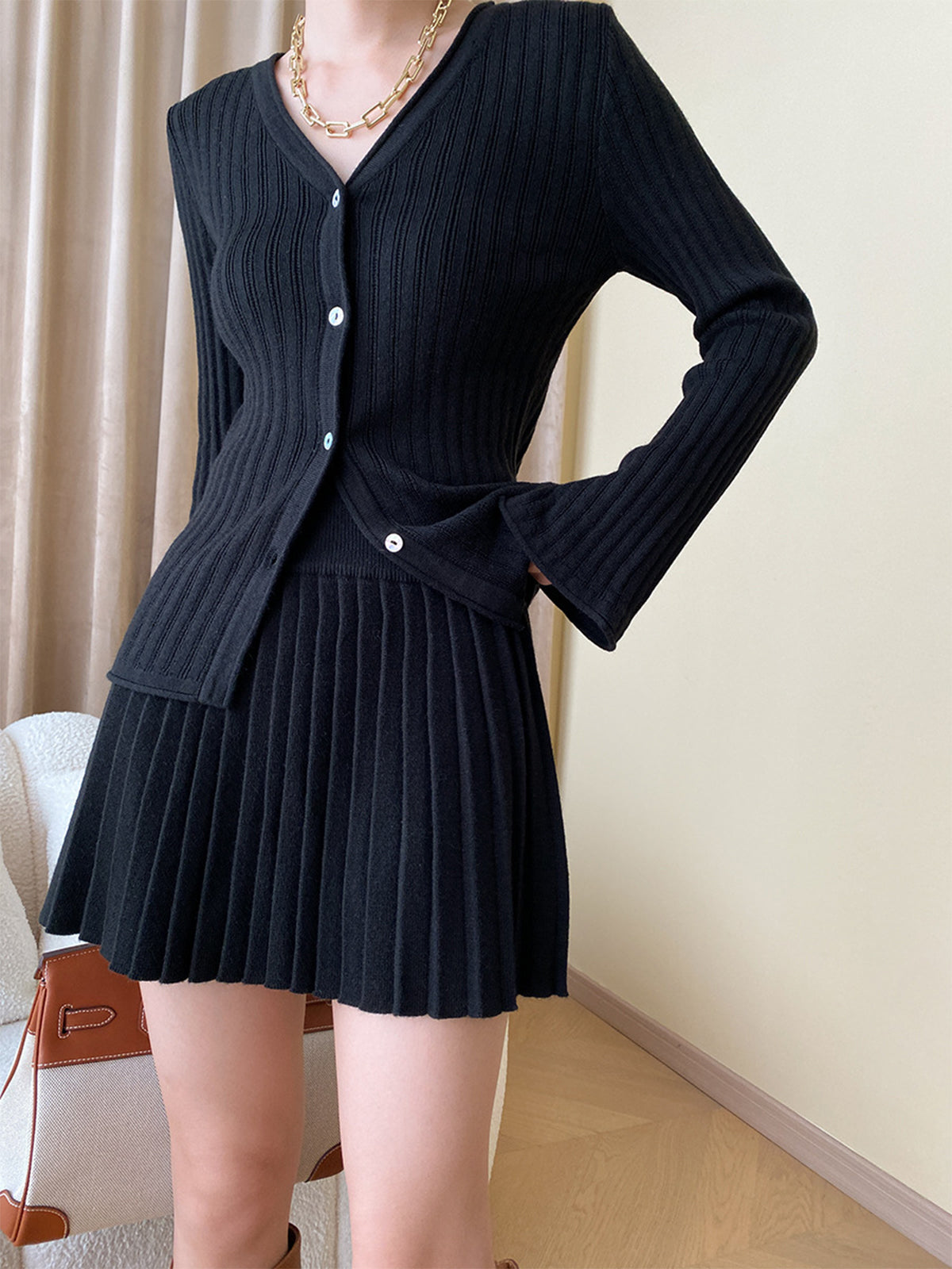 Women's Knitted Co-ord Set in black – Ribbed Cardigan and Pleated Mini Skirt