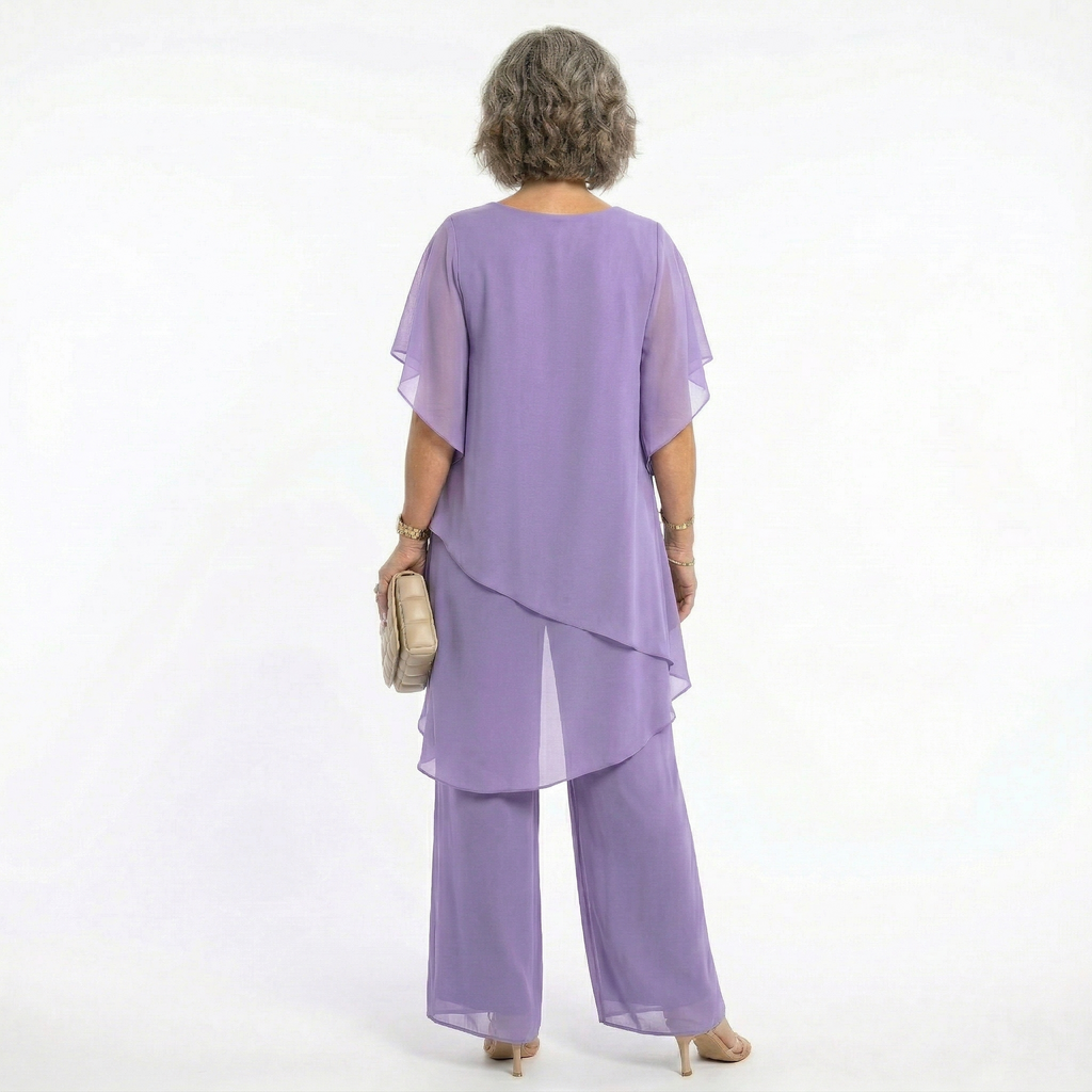 Chiffon tunic and trousers set worn at an occasion, full length