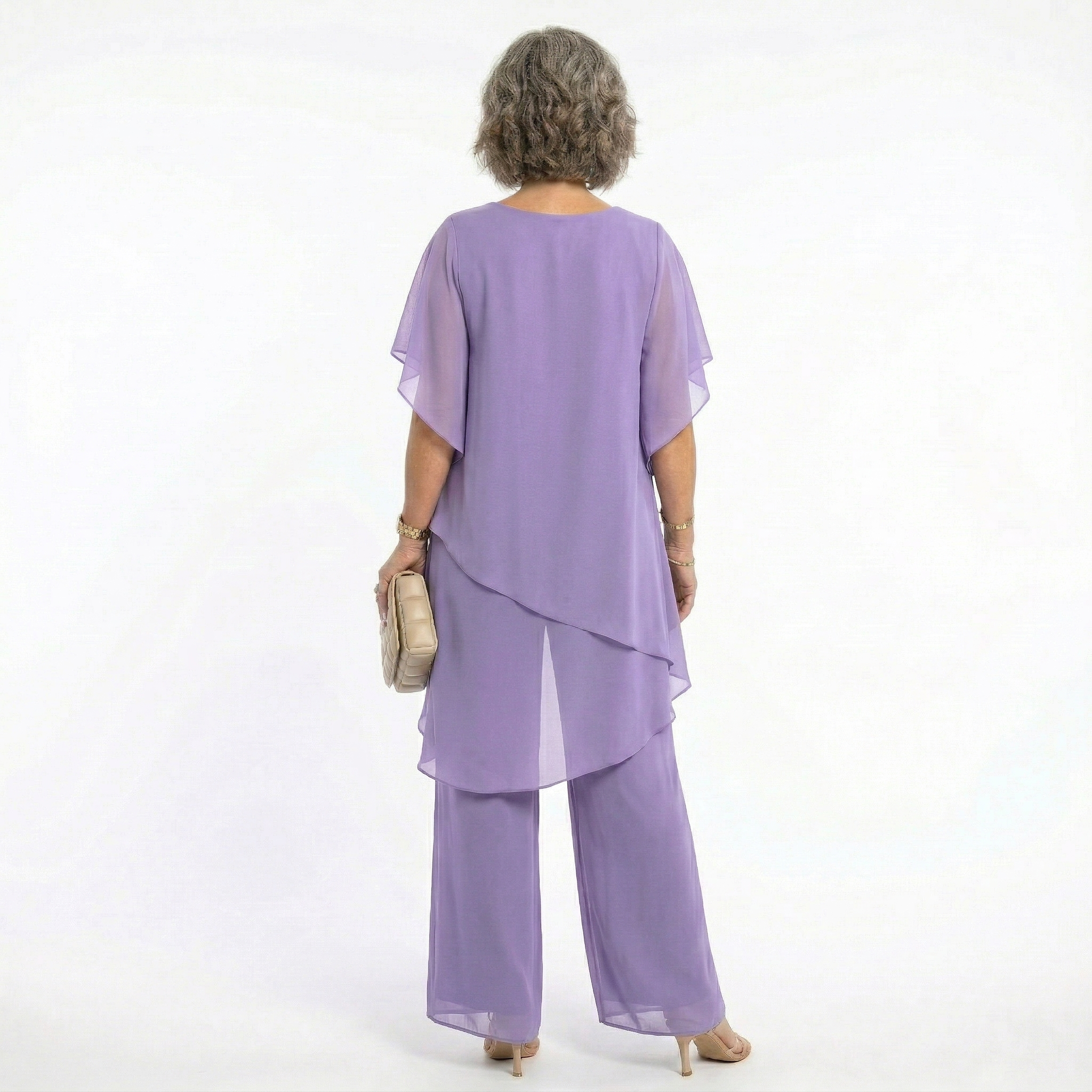 Chiffon tunic and trousers set worn at an occasion, full length
