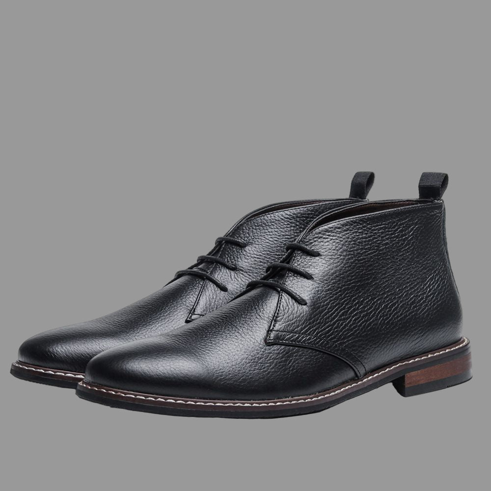 Chukka desert boots worn with jeans