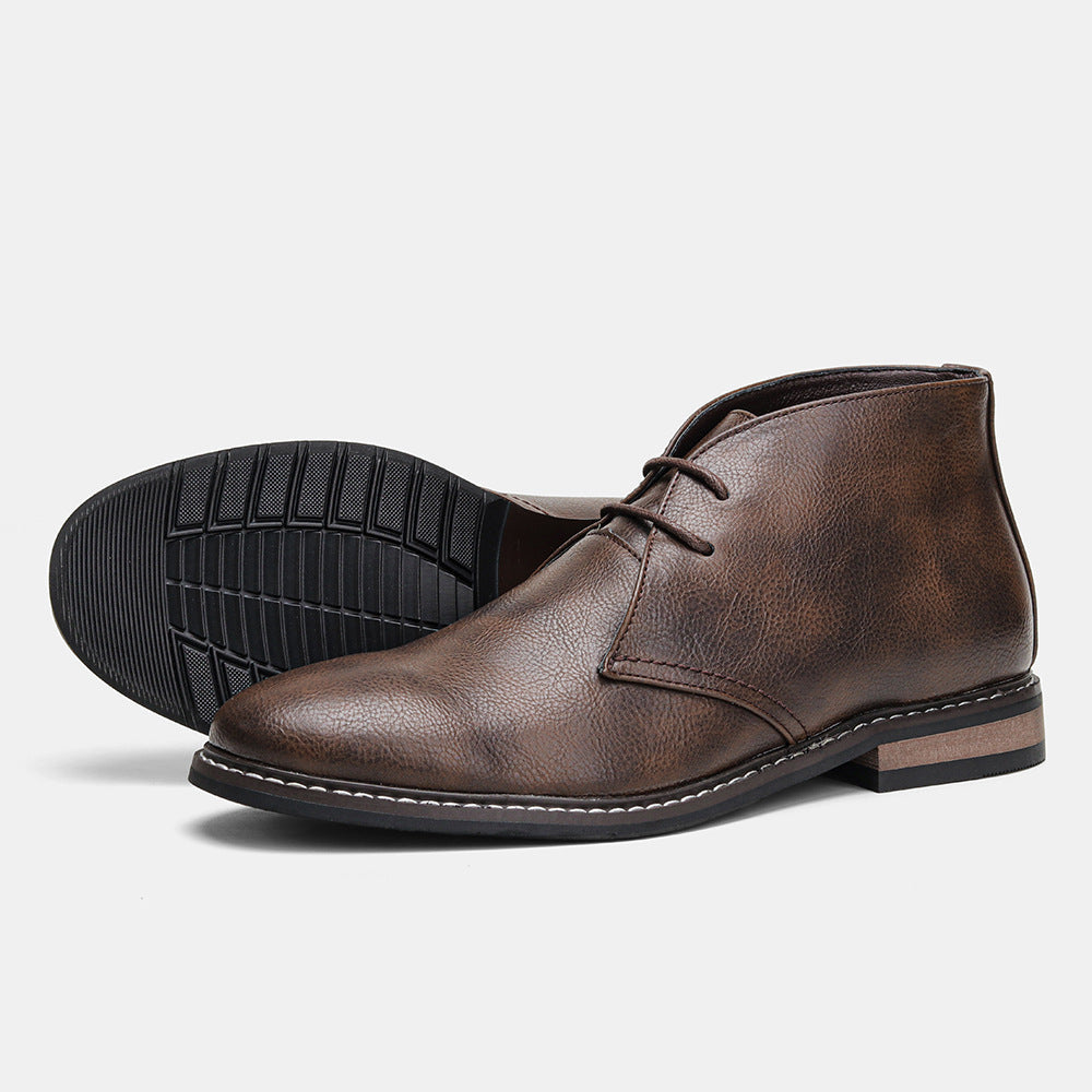 Detail of the two eyelet lace fastening on chukka desert boots
