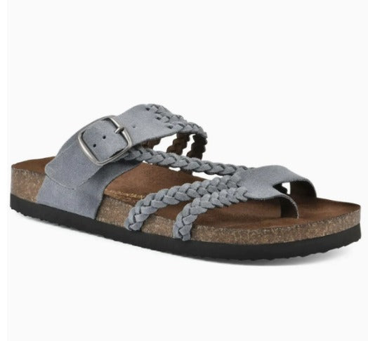 Braided strap sandals worn with summer outfit, close up