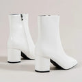 Women's white ankle boots with pointed toe and block heel