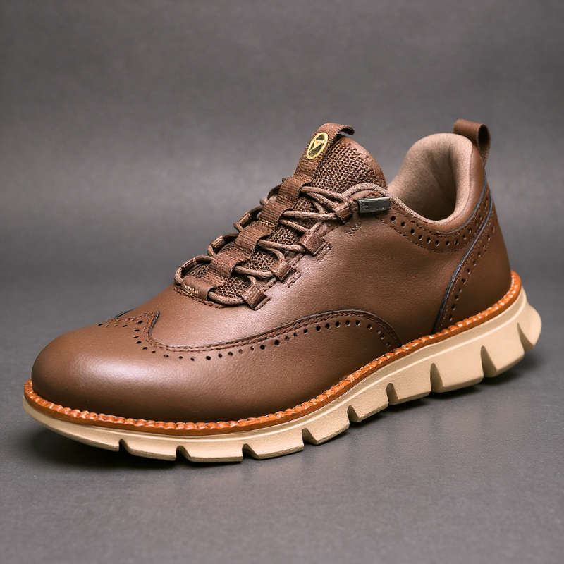Wingtip brogue trainer showing punched toe cap detail, close up