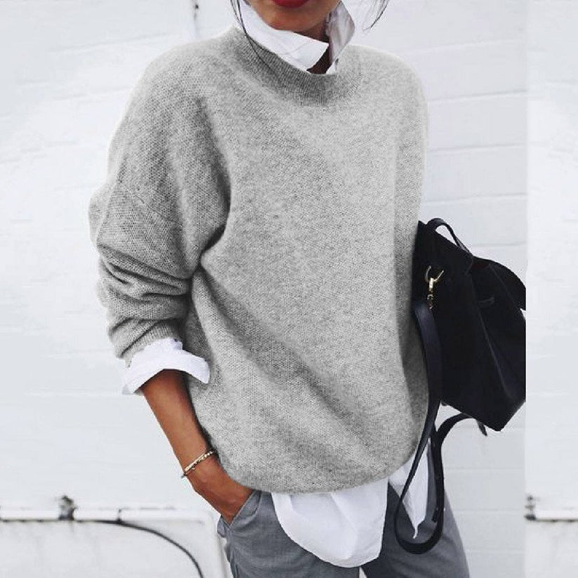 Women's grey oversized crew neck jumper with ribbed cuffs