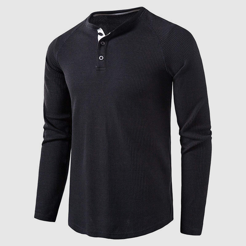 Close view of the waffle knit texture on a men's henley