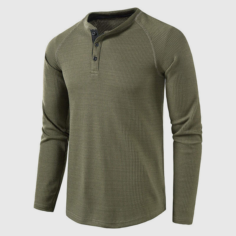 Detail of the three button placket on a men's waffle knit henley