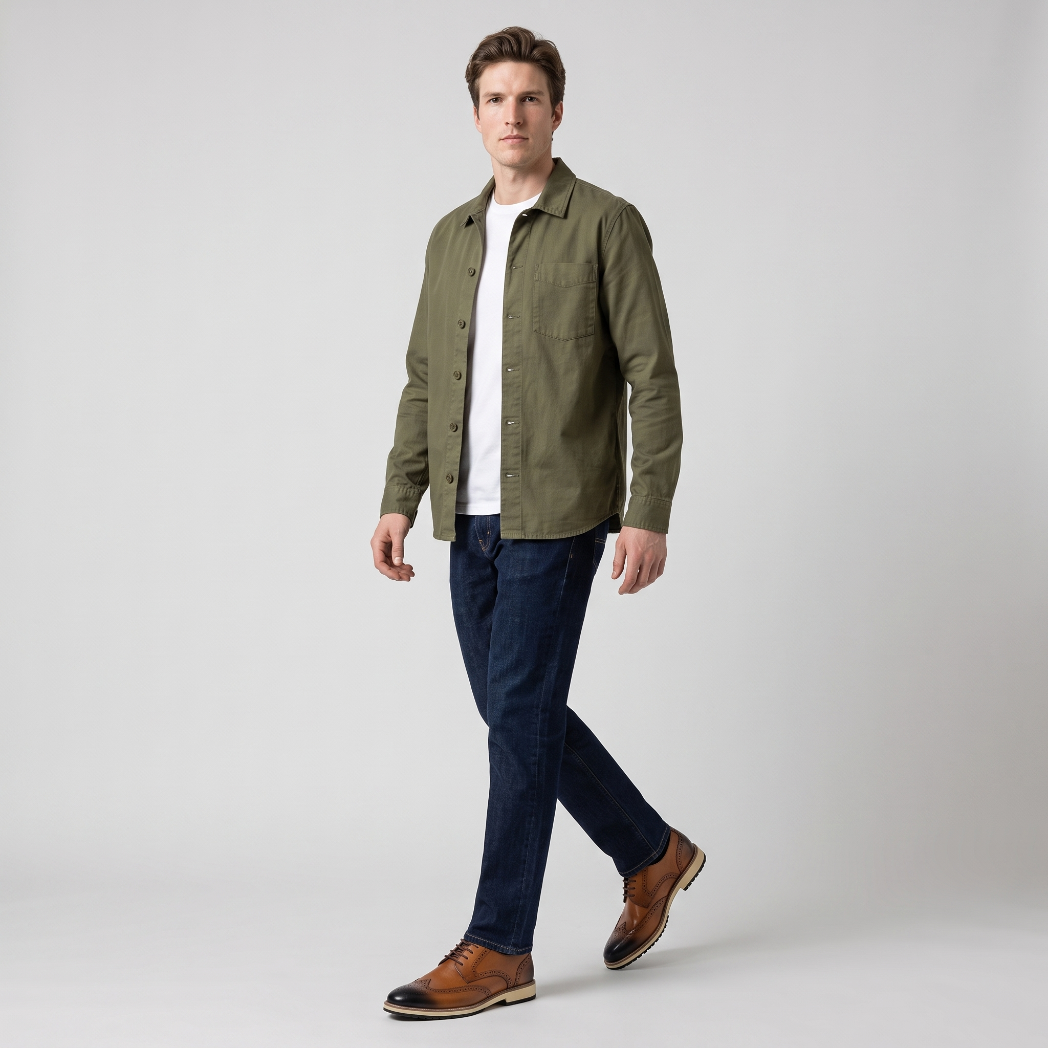 Man wearing two tone brown brogues with indigo jeans and an olive overshirt