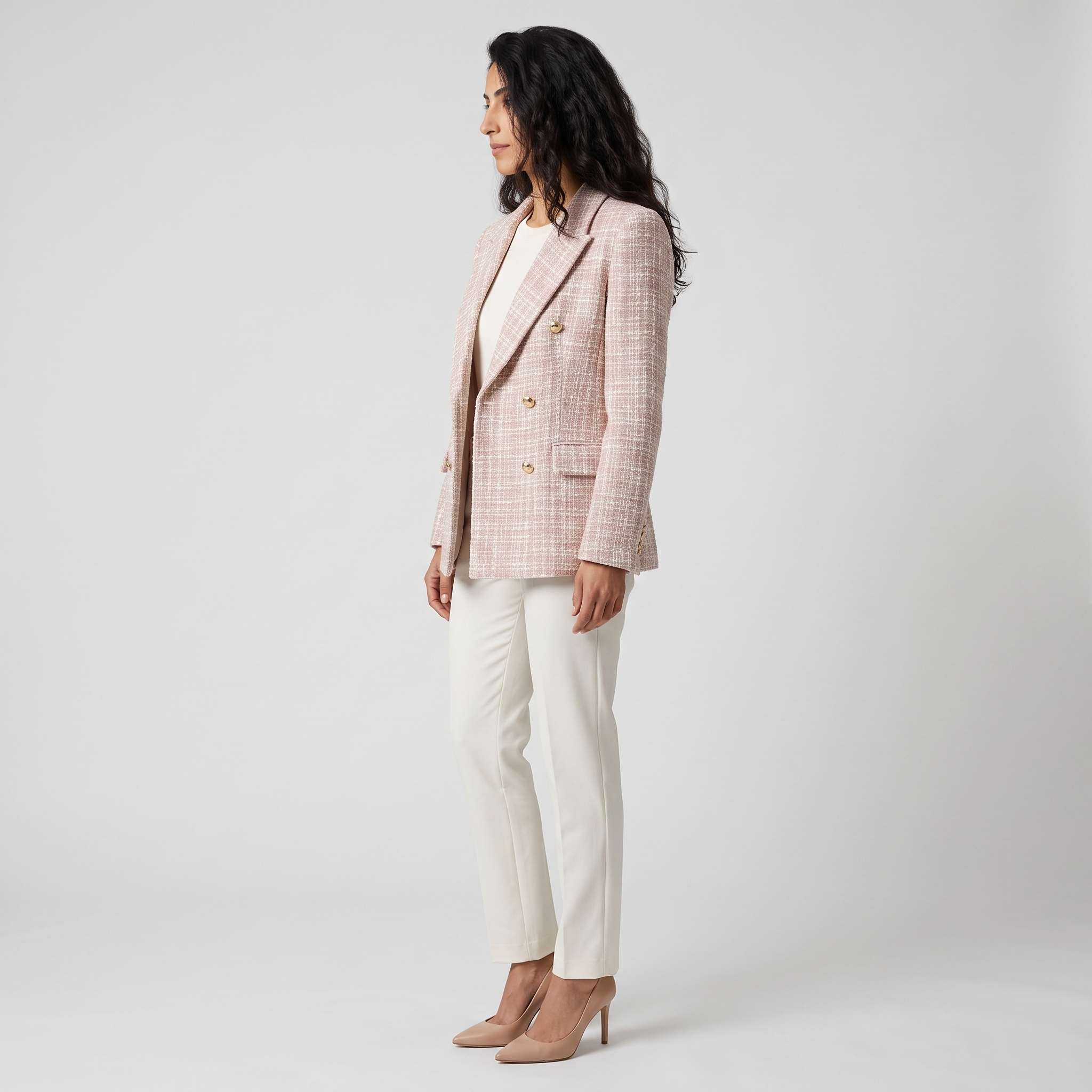 Side view of a pink and ivory tweed double breasted blazer