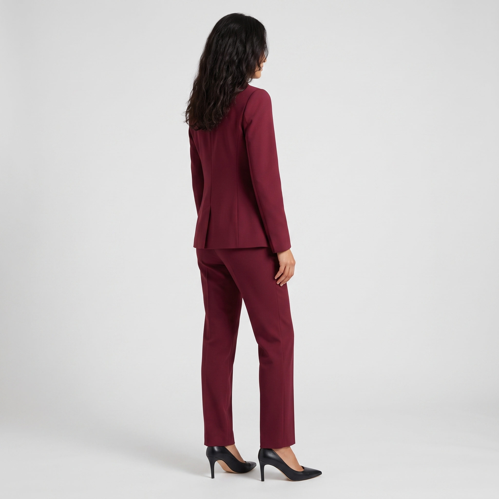 Side view of a wine red tailored blazer with a long notch lapel