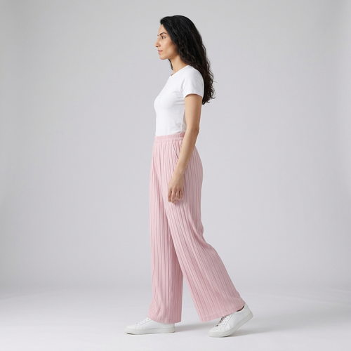 Side view of pale pink pleated wide leg trousers