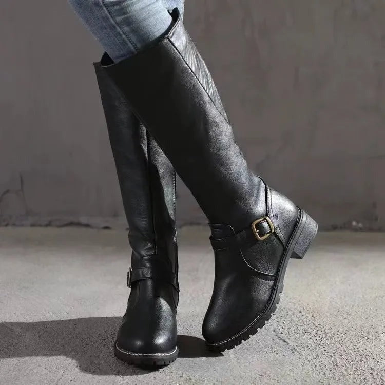 Women's light brown knee high riding boots with flat heel and side zip