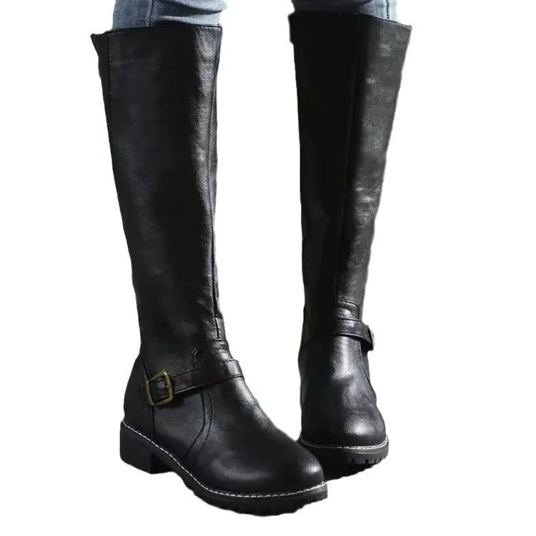 Knee high riding boots showing the full shaft height below the knee