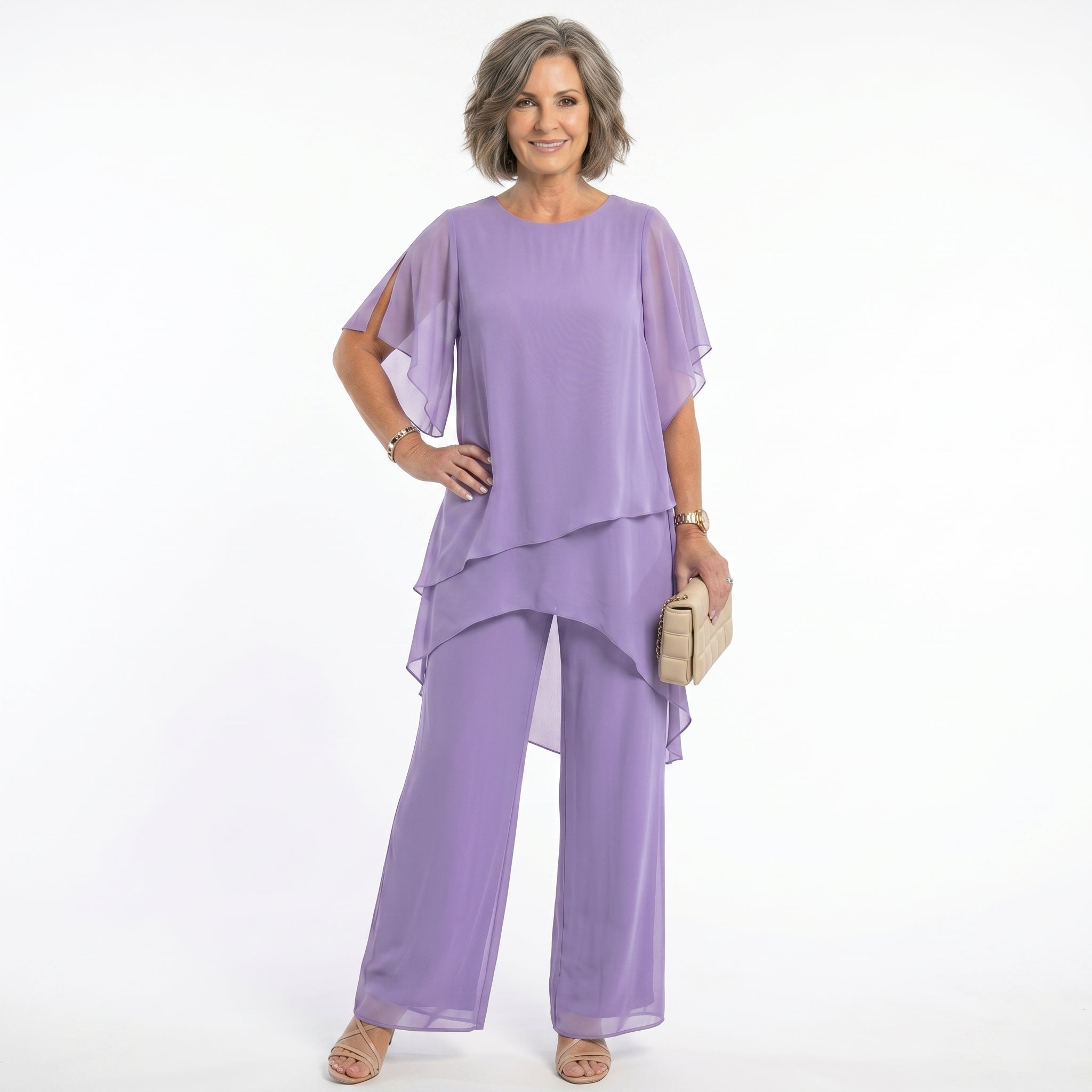 Chiffon two piece set worn with clutch bag, full length