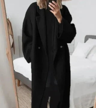 Women's black oversized longline winter coat with dropped shoulders