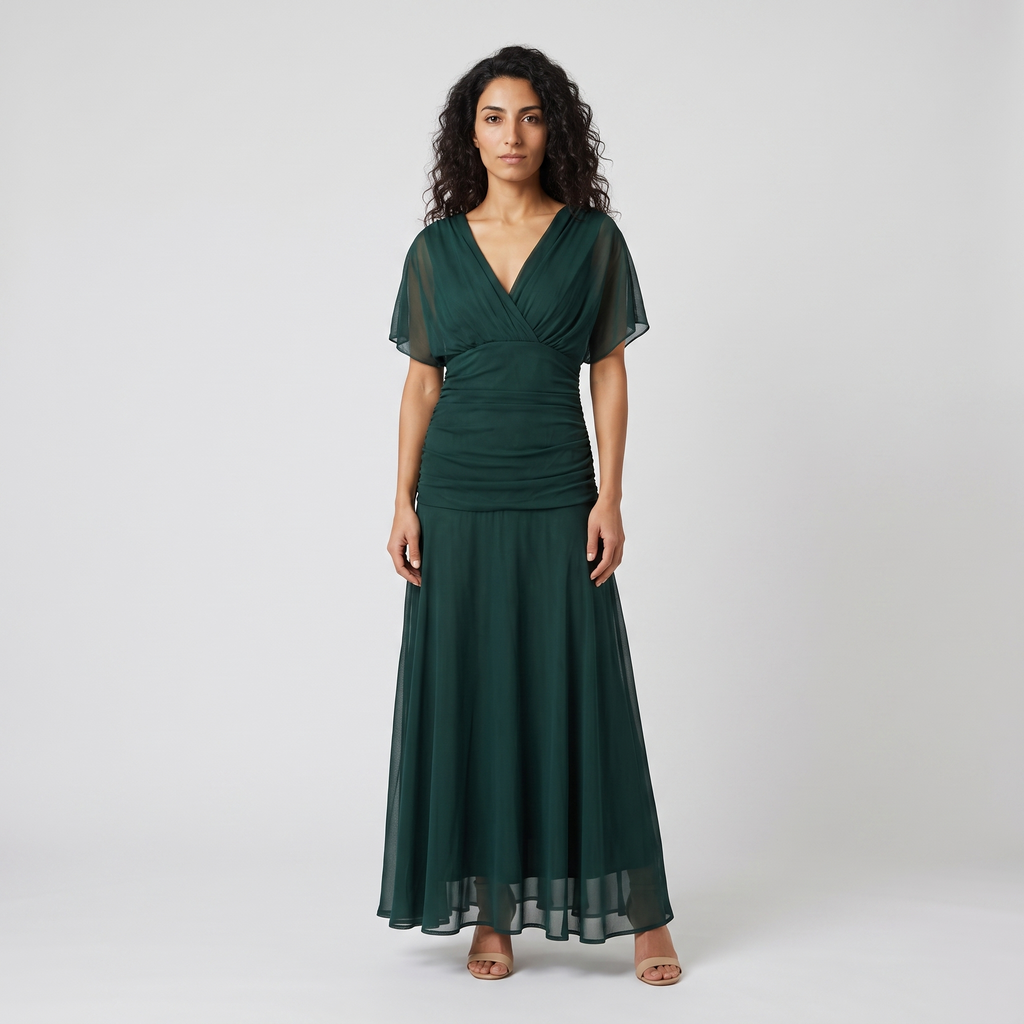 Model wearing the forest green V neck chiffon maxi dress, studio shot